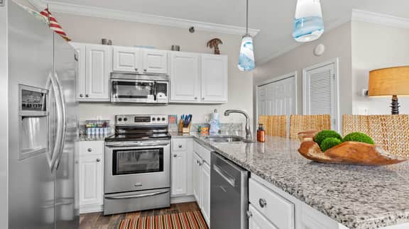 Cozy 3-Bedroom Condo - Comfy Living Space, Two Balconies, Outdoor Pool, Beach Walkable - Score up to 450 Every Day in Tickets for Local Activities - Image 4